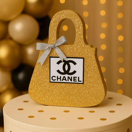 Elegant gold Chanel birthday decorations with glitter detail, ideal for luxury Chanel party theme centerpieces.